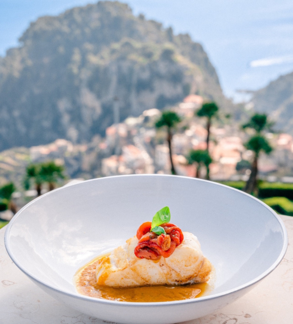 Gourmet dish served with panoramic Amalfi Coast view during a Chef’s Table experience