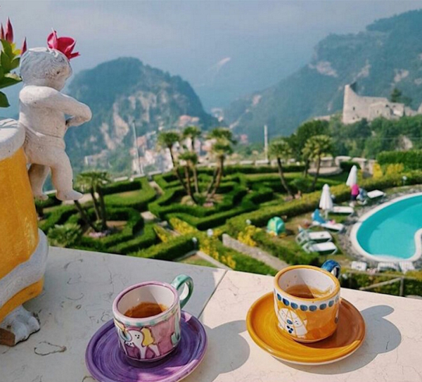 Breakfast with coffee overlooking the Amalfi Coast and pool view in a luxury setting
