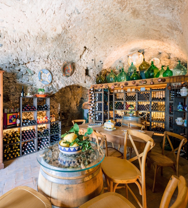 Wine tasting experience in a traditional cellar on the Amalfi Coast with selected Italian wines and ceramic details
